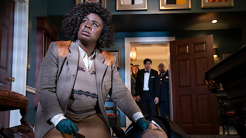 Uzo Aduba as Cordelia Cupp, examining a body in episode 101 of 'The Residence'.