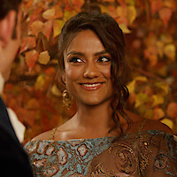 Simone Ashley as Kate Sharma smiles in Season 3 of 'Bridgerton'
