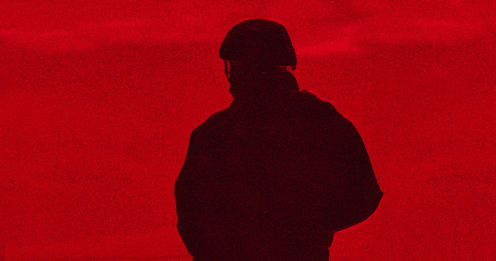 A House of Dynamite key art - a soldier standing against a red background