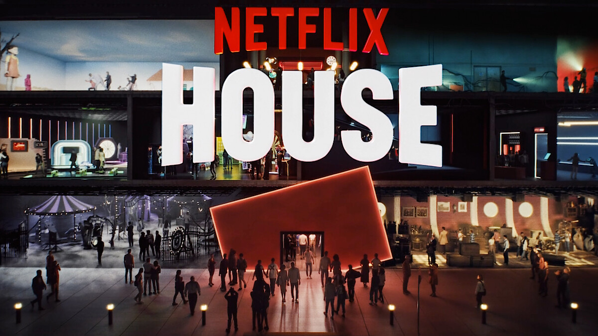 Crowds walk outside a modern, vibrant building labeled "Netflix House," with colorful rooms inside inspired by different Netflix shows.