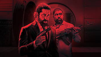  Gerard Butler and O'Shea Jackson Jr. each hold a gun in this promotional image from 'Den of Thieves 2: Pantera."