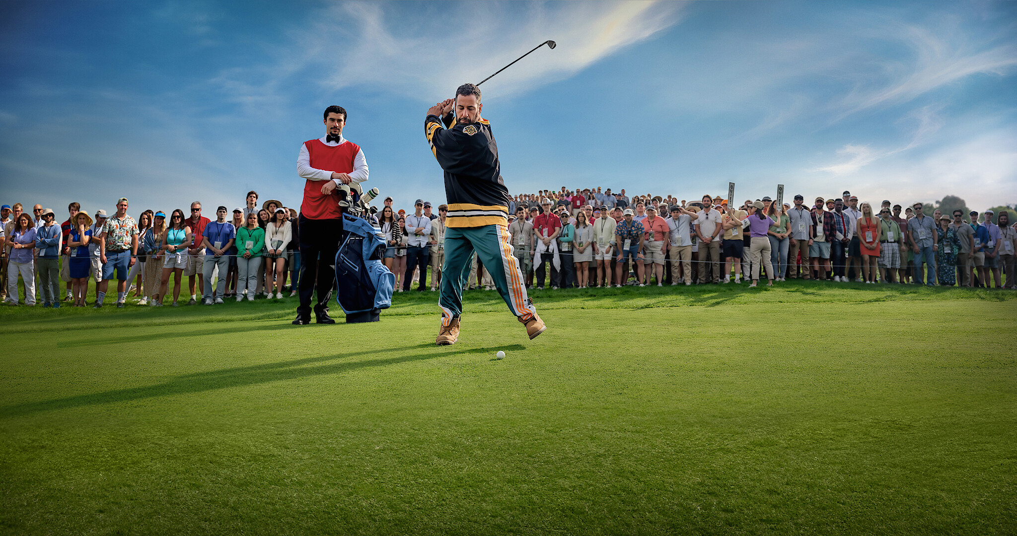 Happy Gilmore 2 - Adam Sandler swinging a club on the golf course in Happy Gilmore 2. 