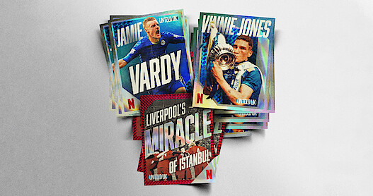 A stack of Netflix trading cards featuring football themes, including players in action and titles like "Jamie Vardy," "Vinnie Jones," and "Liverpool’s Miracle of Istanbul," photographed on a plain, light background.