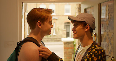 Joe Locke as Charlie and Kit Connor as Nick look into each other's eyes in Season 3 of 'Heartstopper.'