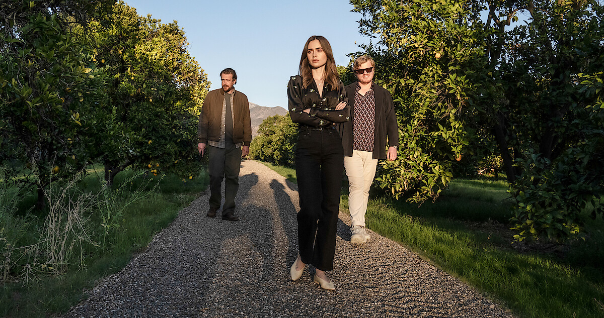 Lily Collins & ‘Windfall’ Costume Designer Discuss Her Power Outfit
