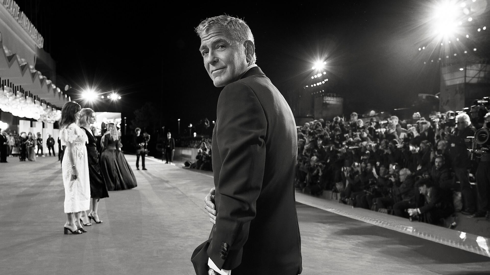 George Clooney seen walking the red carpet for the global premiere of Jay Kelly at the 2025 Venice Film Festival.