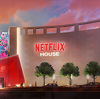 Digital illustration of a wide building with a sign on the exterior that reads Netflix House.