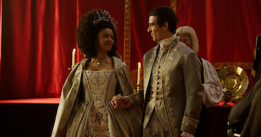 India Amarteifio and Corey Mylchreest as Young Queen Charlotte and Young King George.
