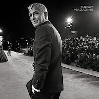 George Clooney seen walking the red carpet for the global premiere of Jay Kelly at the 2025 Venice Film Festival.