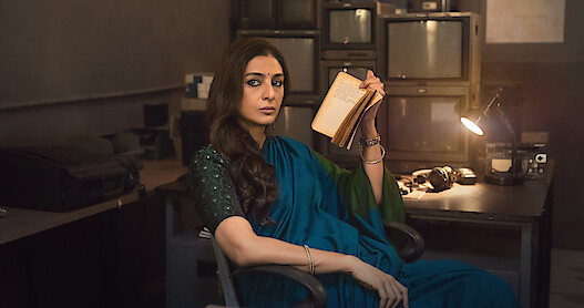 Khufiya sitting at a desk