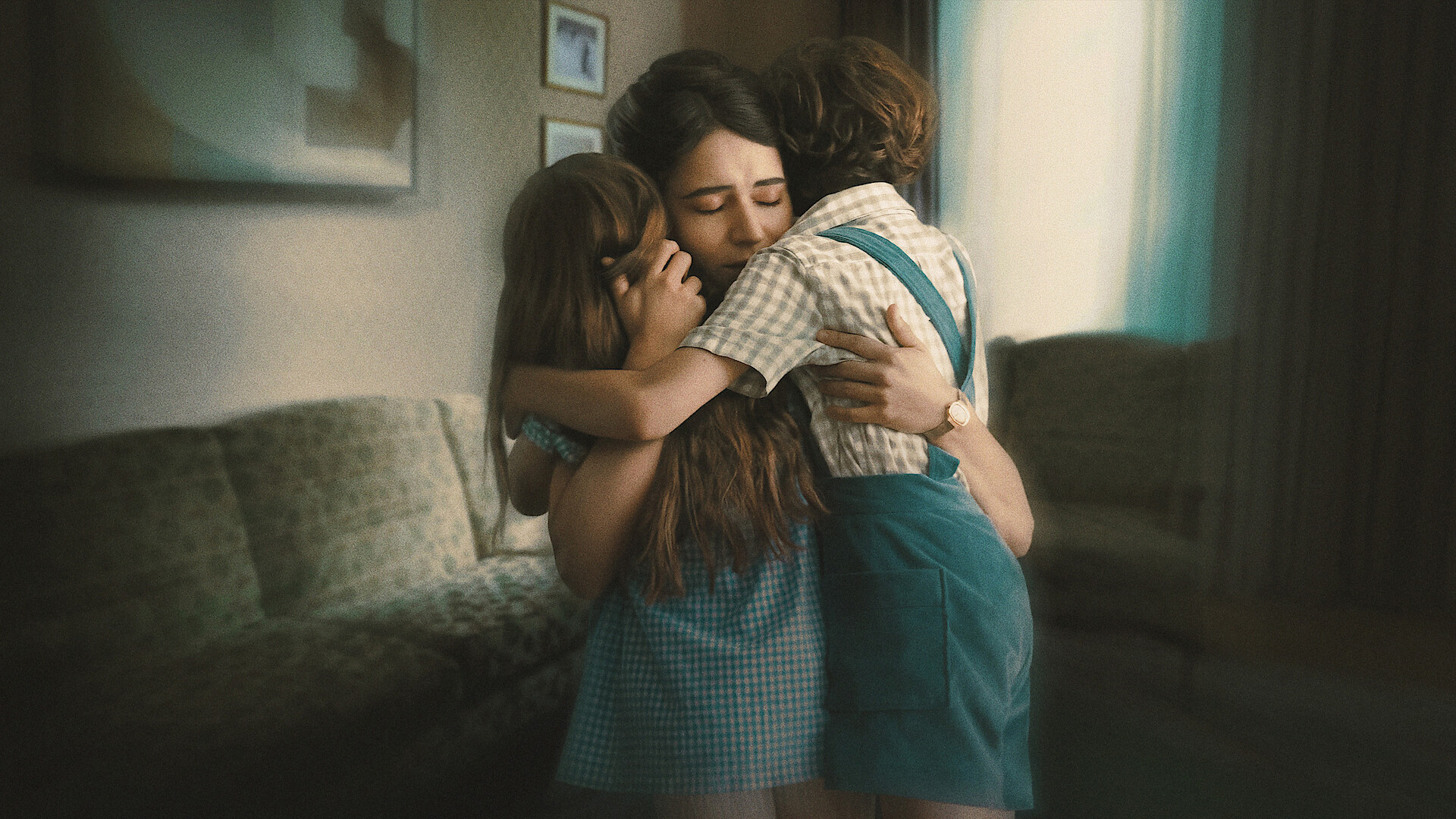 No One Saw Us Leave - A mother hugging two children