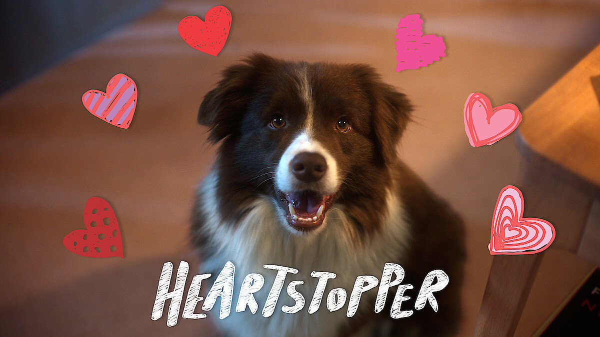 Nellie Nelson looking directly at the viewer surrounded by hand-drawn hearts with the text "Heartstopper" in front of her.