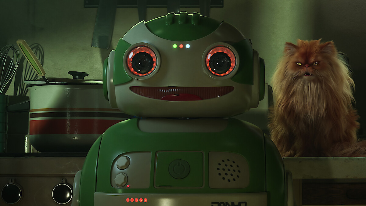 A cheerful green robot with glowing red eyes stands in a kitchen, while a grumpy-looking, fluffy orange cat sits on the counter next to cereal boxes labeled "CRUNCHY BALLS."