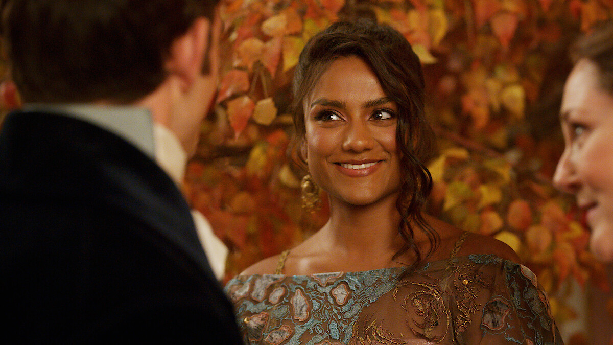 Simone Ashley as Kate Sharma smiles in Season 3 of 'Bridgerton'