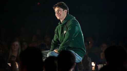 Matt Rife sits on a stool during 'Lucid - A Crowd Work Special.'