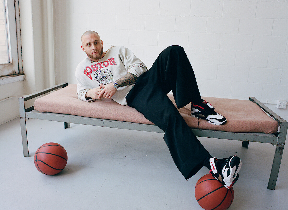 Chet Hanks on cot with basketball