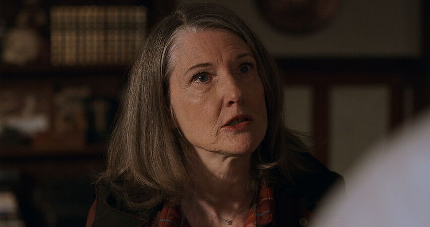 Older woman giving a talk
