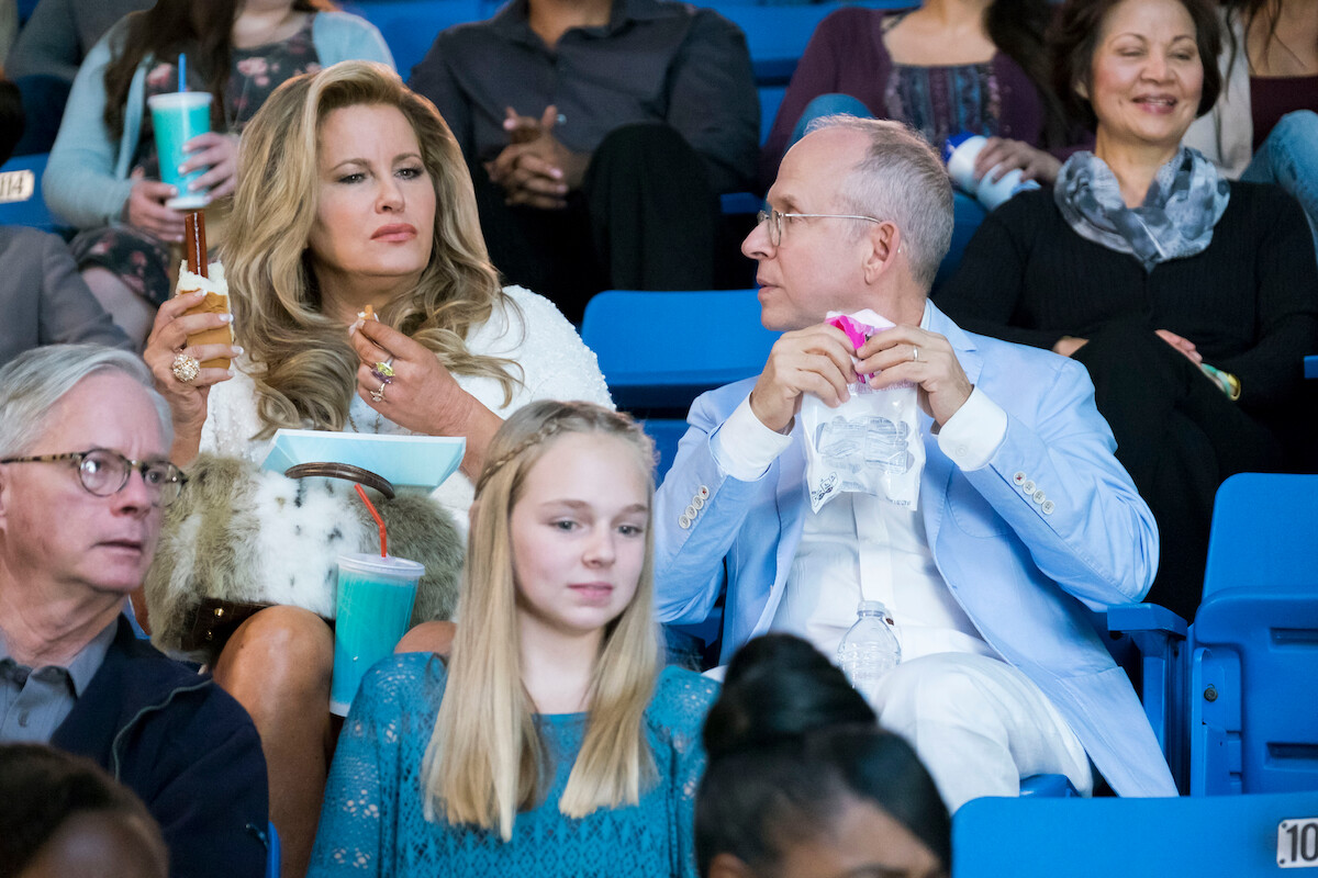 Jennifer Coolidge in the stands at a game. 