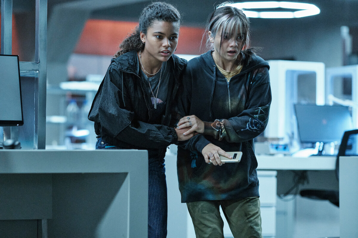 Left: Tamara Smart as Young Jade Wesker in Resident Evil.