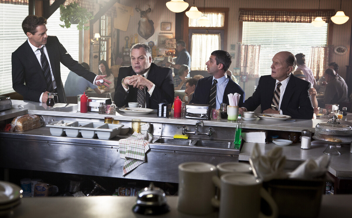 Robert Downey Jr., Vincent D'Onofrio, Jeremy Strong, and Robert Duvall sit at a diner counter in an image from the film ‘The Judge’