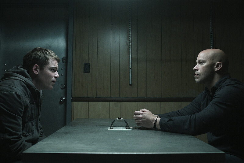Gabriel Basso as Peter Sutherland and Berto Colon as Solomon in Season 2 of 'The Night Agent'
