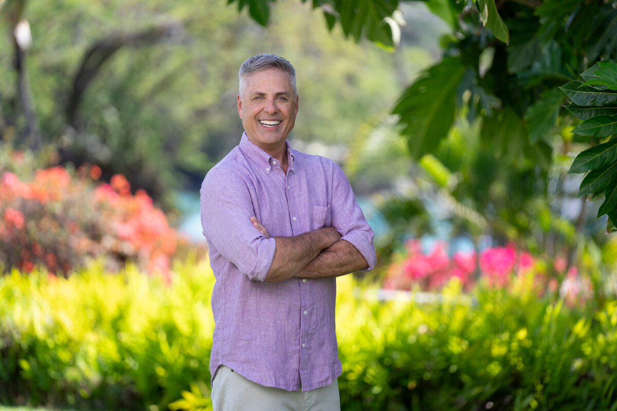 Mark L. Walberg stands.