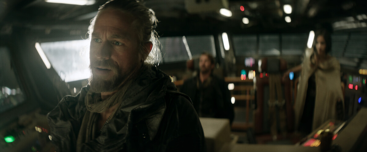 Charlie Hunnam as Kai and Michiel Huisman as Gunnar and Sofia Boutella as Kora