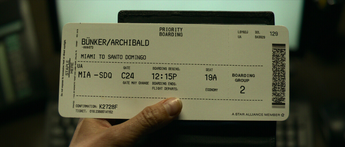 A plane ticket from Miami to Santo Domingo bears the name Archibald Bünker.