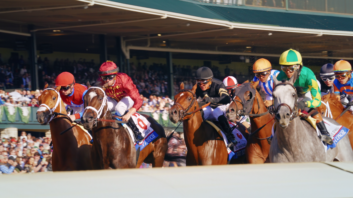Jockeys on their horses during a race.