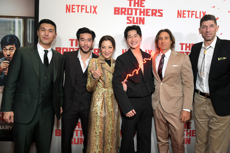 Byron Wu, Justin Chien, Michelle Yeoh, Sam Song Li, Brad Falchuk, and Mikkel Bondesen pose together on the red carpet at Netflix's 'The Brothers Sun' Los Angeles Premiere
