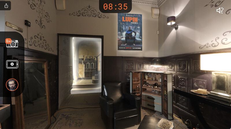 Assane Diop's lair with a 'Lupin' poster in 'Lupin Experience' 