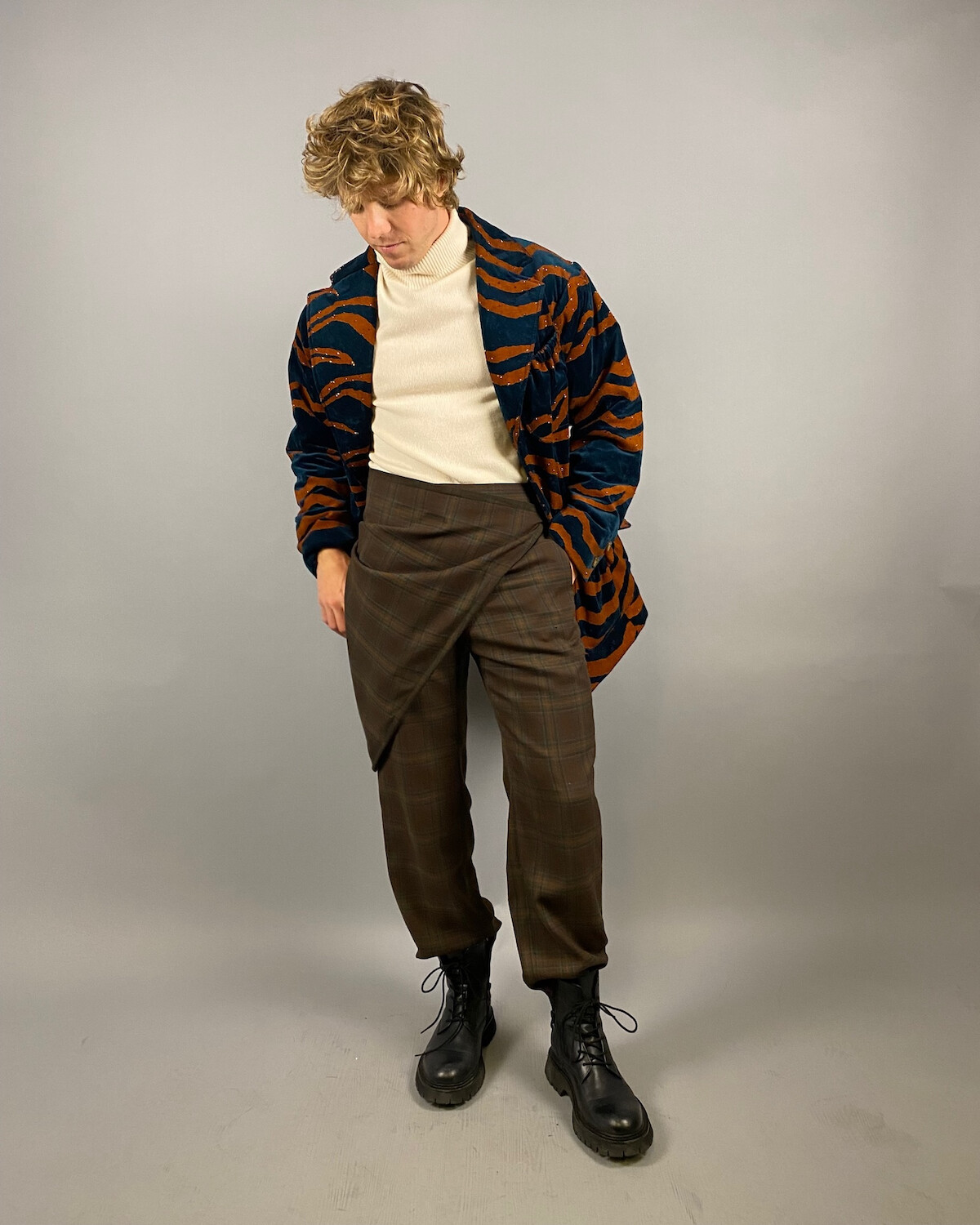 Lukas Gage in the Cat King wardrobe fitting for ‘Dead Boy Detectives’.