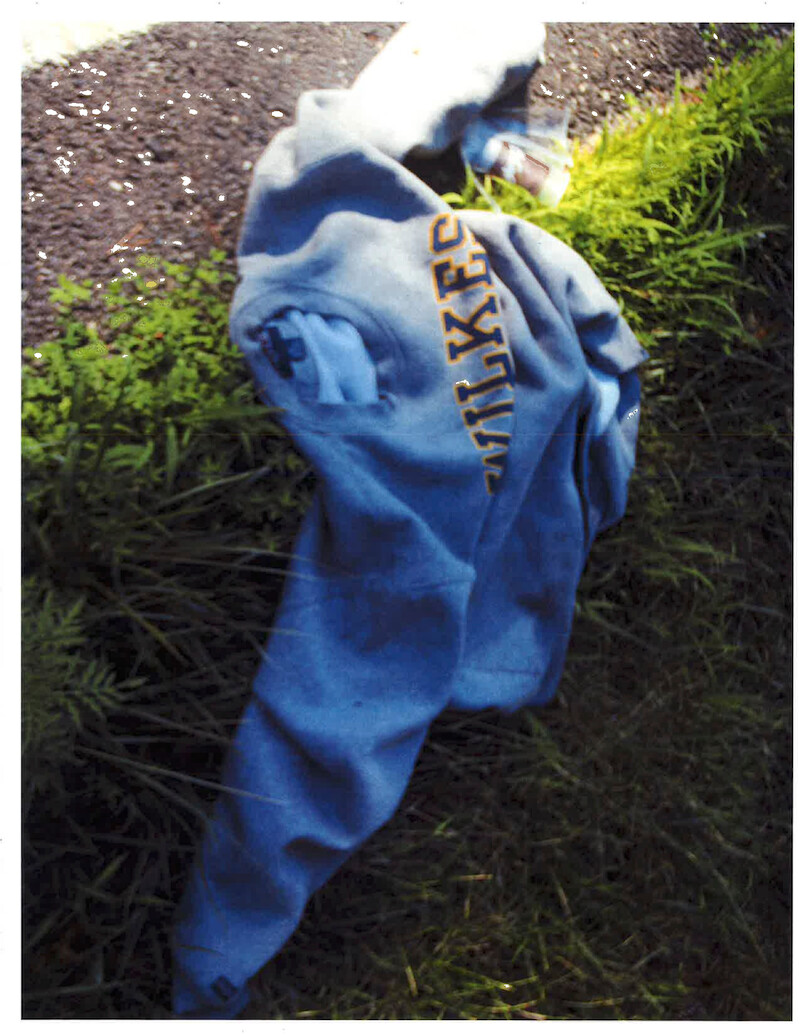 This blue sweatshirt was found near Tiffany’s shoes and headband. -  ‘Unsolved Mysteries’ Episode 1: Roadside clues
