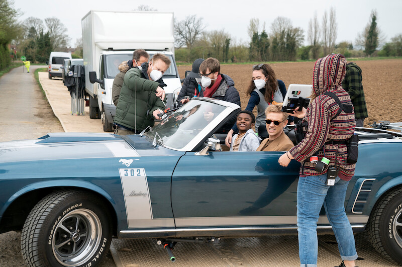 The Corinthian (Boyd Holbrook) kidnaps Jed (Eddie Karanja) and takes him on a joyride.