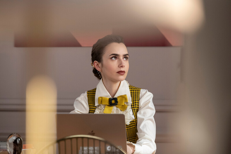 Lily Collins as Emily works at her office in Season 4 of 'Emily in Paris'