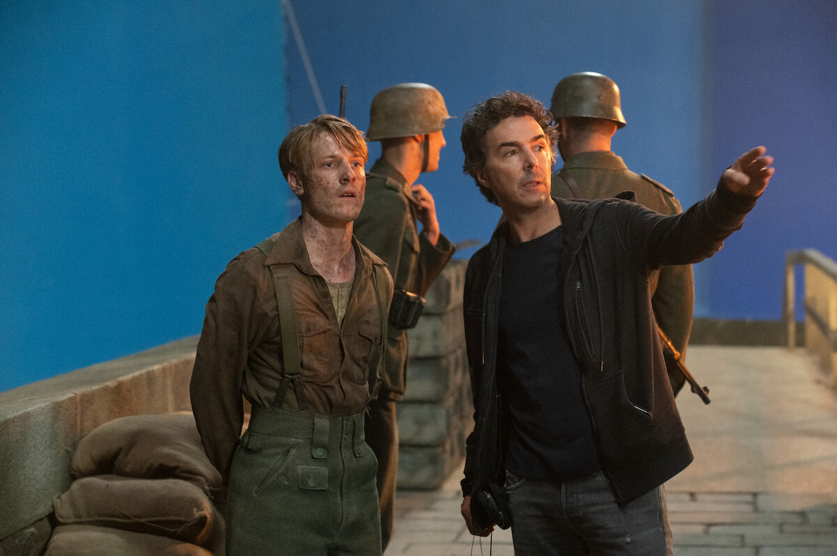 Louis Hofmann as Werner Pfennig, Director/Executive Producer Shawn Levy in episode 104 of All the Light We Cannot See. 