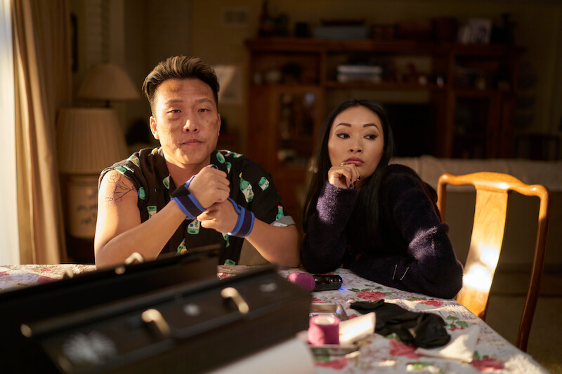 Joon Lee as TK, Alice Hewkin as June in episode 108 of The Brothers Sun.