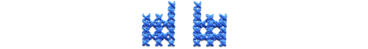 Blue cross stitched fence.