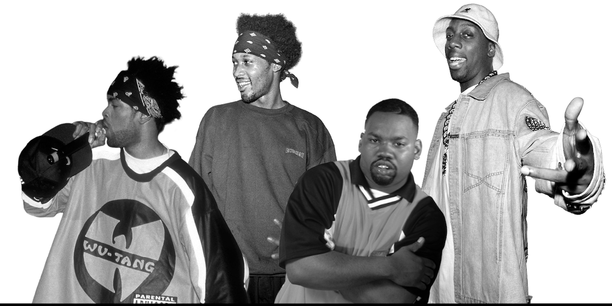 Four men stand and pose together in urban clothing, including a large Wu-Tang Clan shirt. The image is in black and white with no visible background, evoking a hip-hop or rap music group setting.
