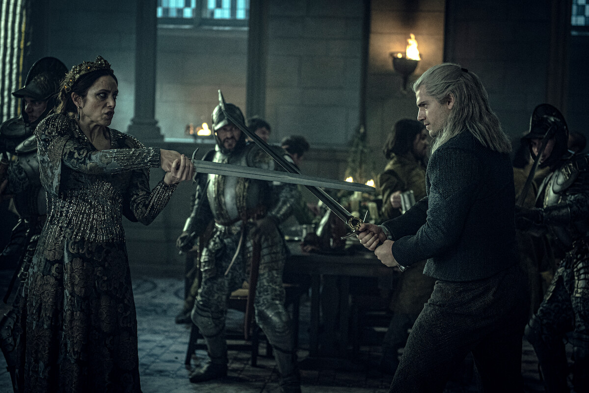Jodhi May as Queen Calanthe and Henry Cavill as Geralt of Rivia