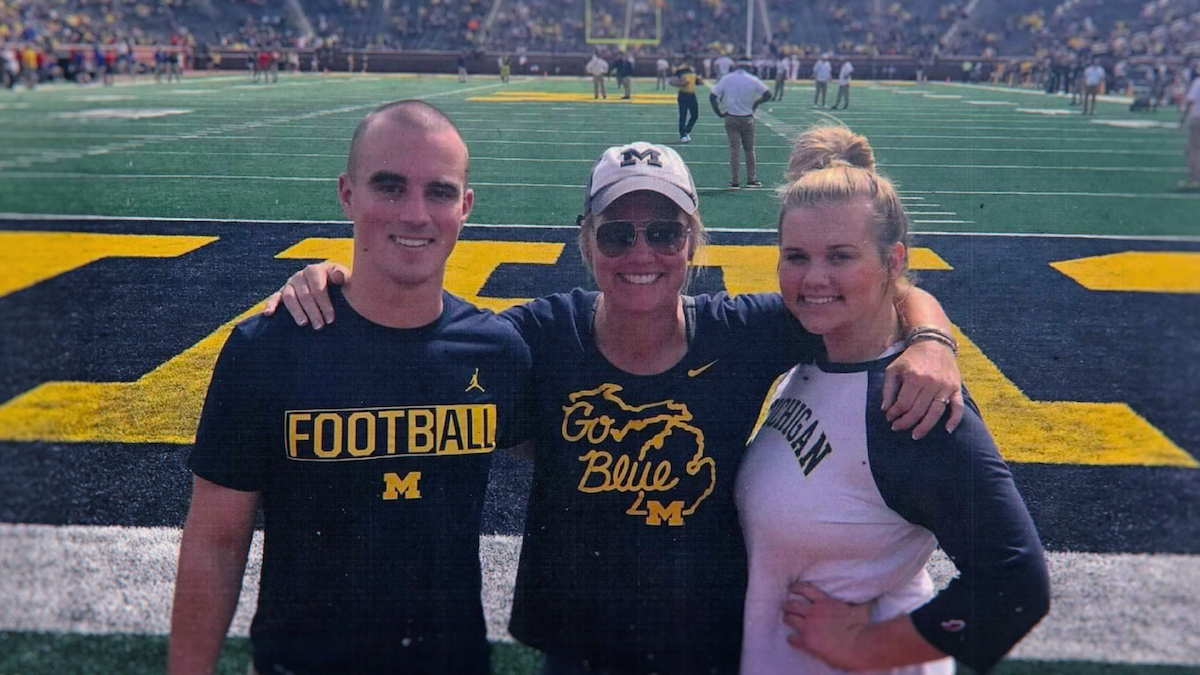 Connor Stallions on the field with his family.