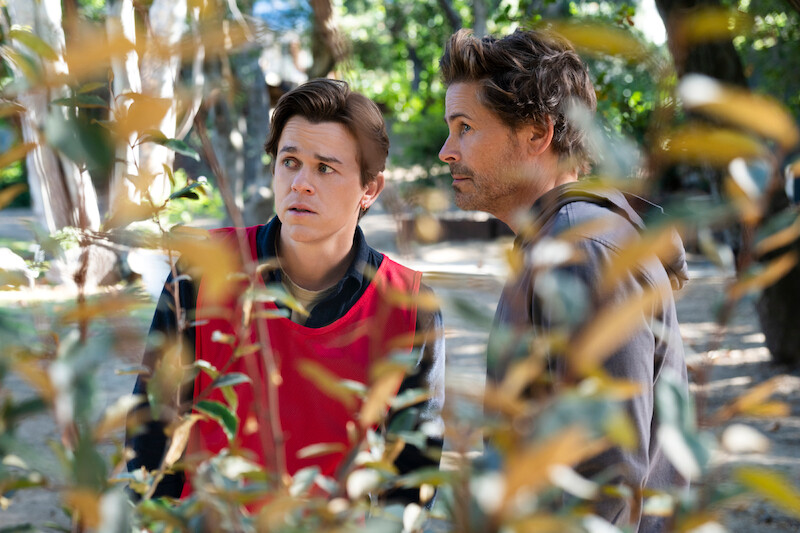 John Owen Lowe as Jackson and Rob Lowe as Ellis show concerned expressions in Season 2 of 'Unstable'