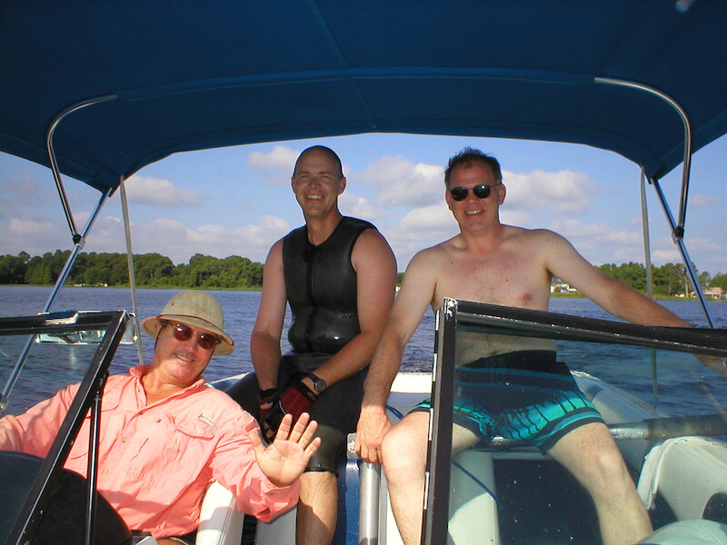 Gray and Pat Mullins with their friend, Damon Presswood, in his boat.