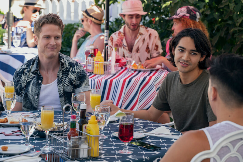 Three people sitting at a table
