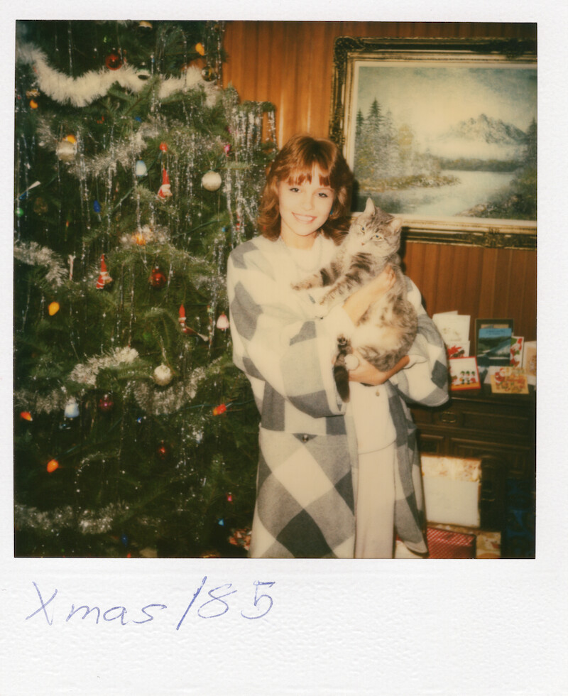 Pamela with her cat on Christmas.