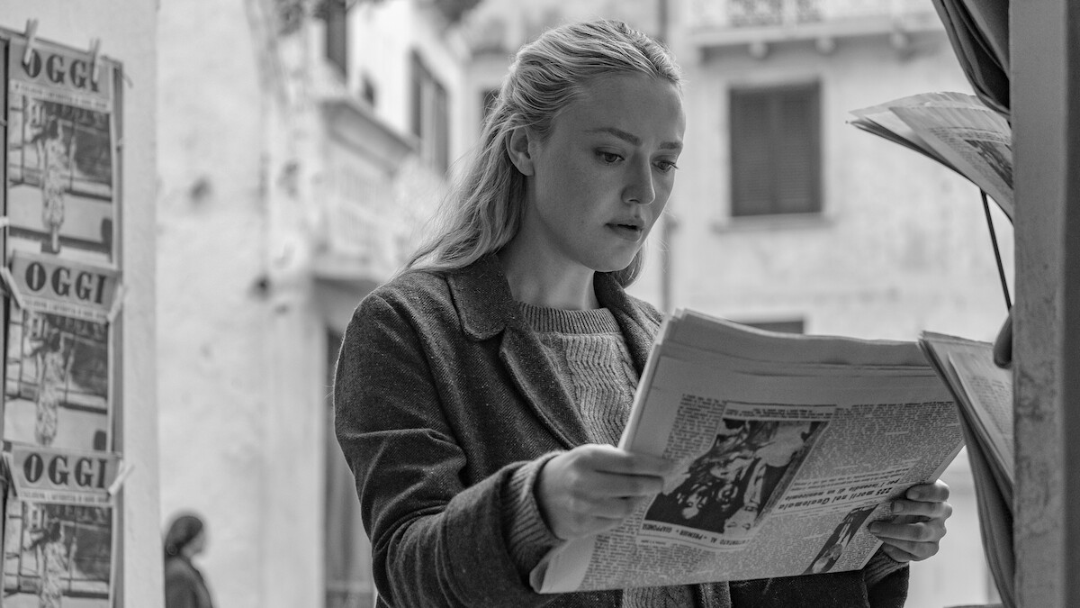 Dakota Fanning as Marge Sherwood reads a newspaper in ‘Ripley’