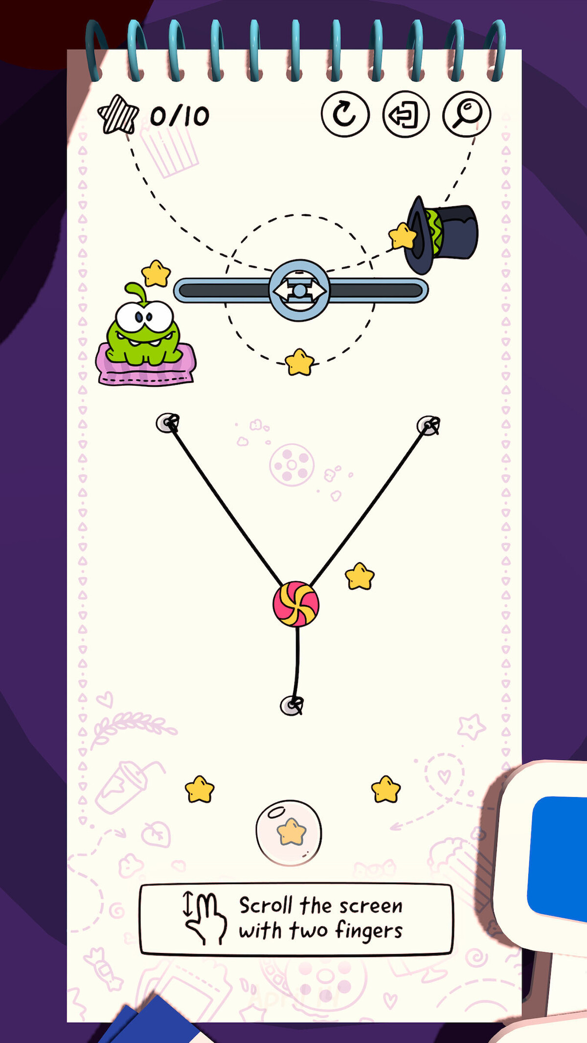 An in-game screenshot of Cut the Rope Daily mobile game, showing instructions to “Scroll the screen with two fingers”.