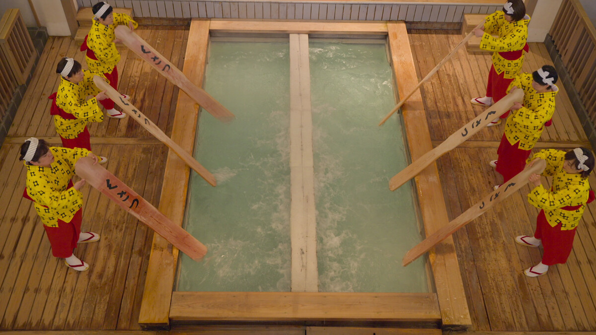 Ladies stand at the Japanese bathhouse
