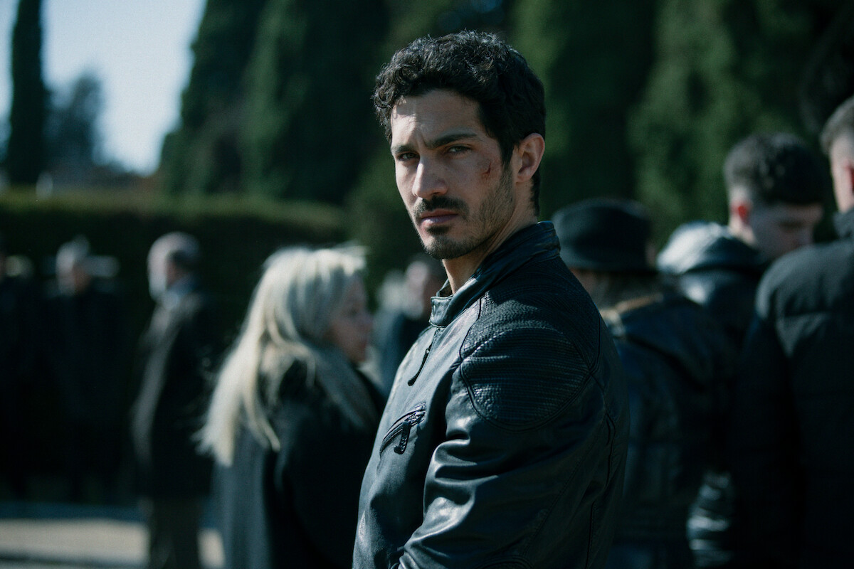 Chino Darín as Víctor Julve looks toward the camera in a production image from Season 1 of ‘Iron Reign.’