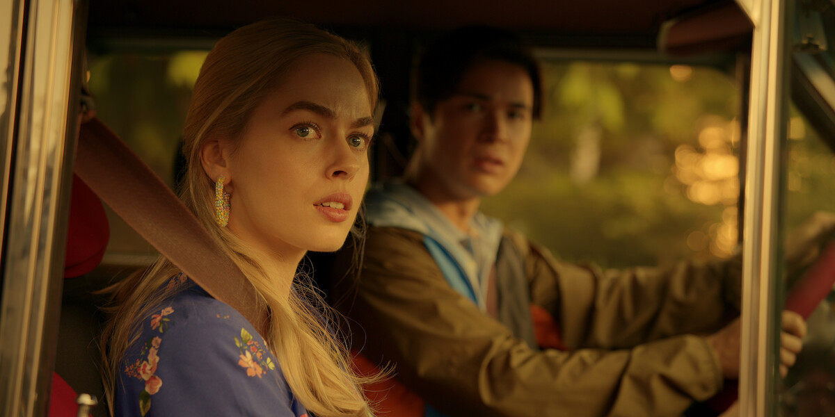 Sarah Dugdale as Lizzie and Kai Bradbury as Denny ride in a car together in Season 5 of ‘Virgin River.’